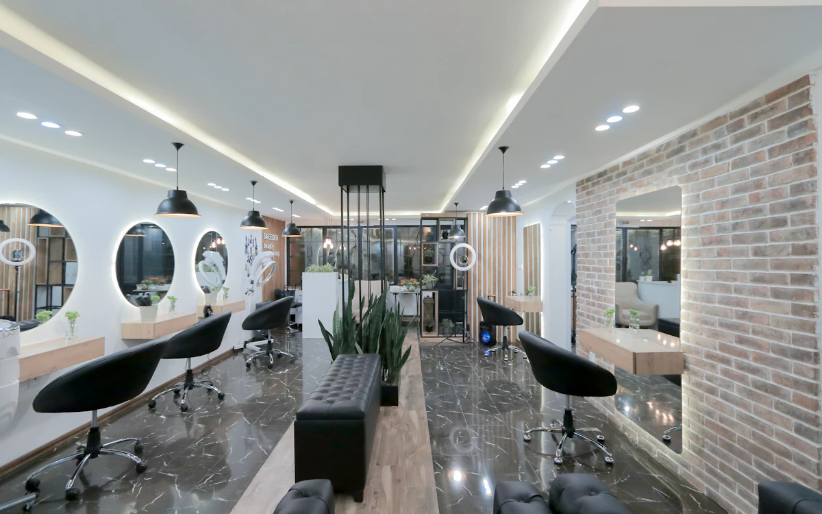 Bright, modern salon interior with styling chairs